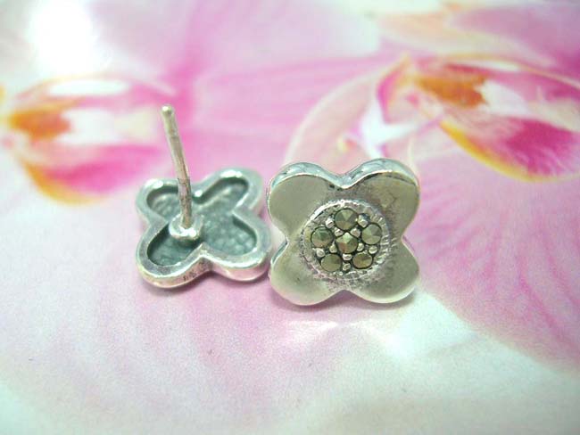 Crafted indonesia jewelry company imports Fun flower inspired stud earrings with gemstones inlaid on 925. sterling silver