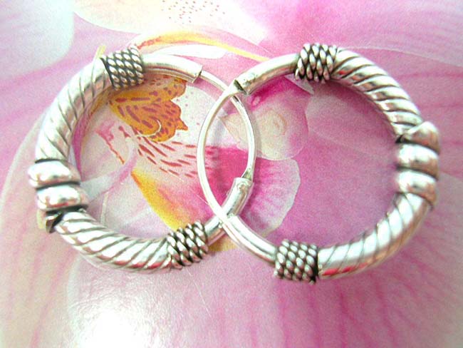 Jewelry retail outlet supplier, Solid 925. sterling silver hoop  earrings with band twisting around hoop and crafted bead design