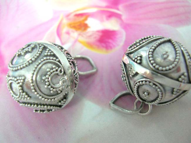 Solid silver pendant ball with unique bead and rod deigns. Indonesian export gift supplies 