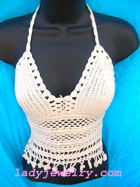 Indonesian crochet halter top shirt in white with fringe hem. Handcrafted fashion distribution importer 