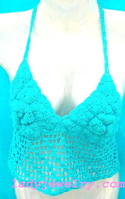 Trendy beach resort boutique. Aqua blue balinese halter top in handmade knit pattern  