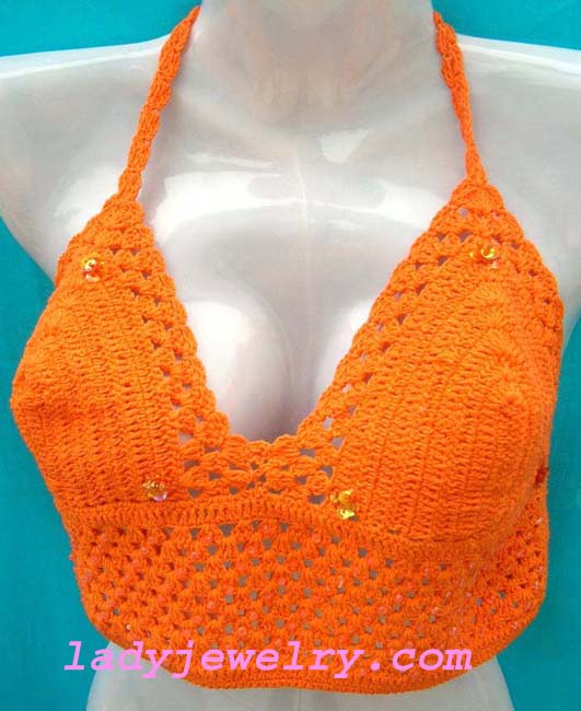 Indonesia fashion clubwear boutique. Beach halter top in bright orange knitted design 