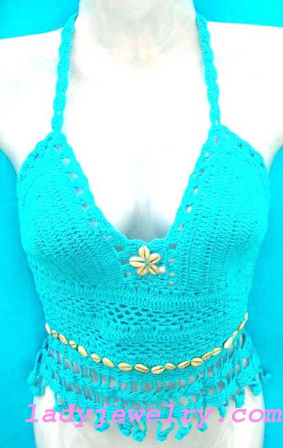 Beach apparel online shopping. Handcrafted knitted crochet halter top in sky blue with seashell crest and shell beaded waist line 